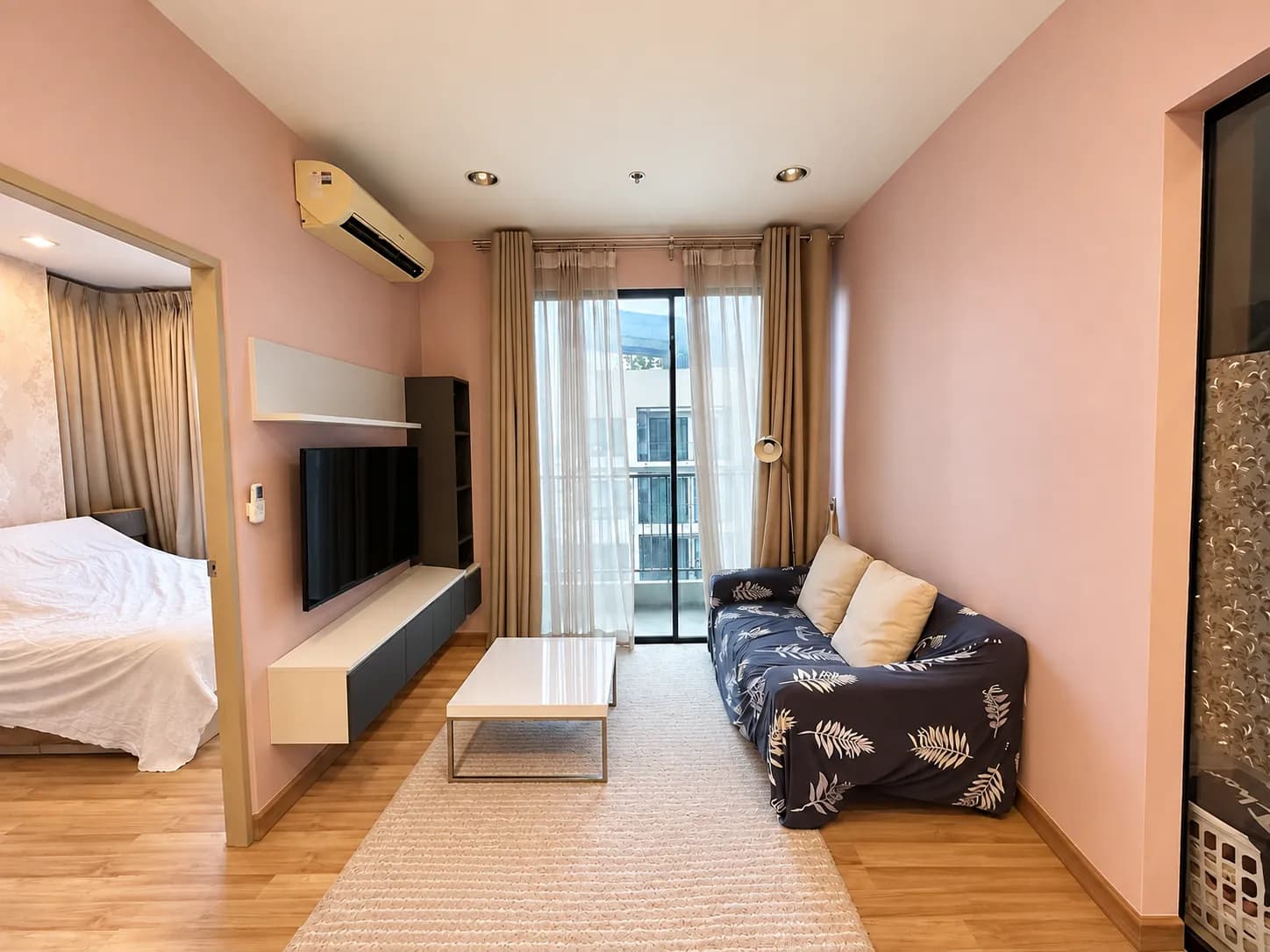 Living room with pink curtains