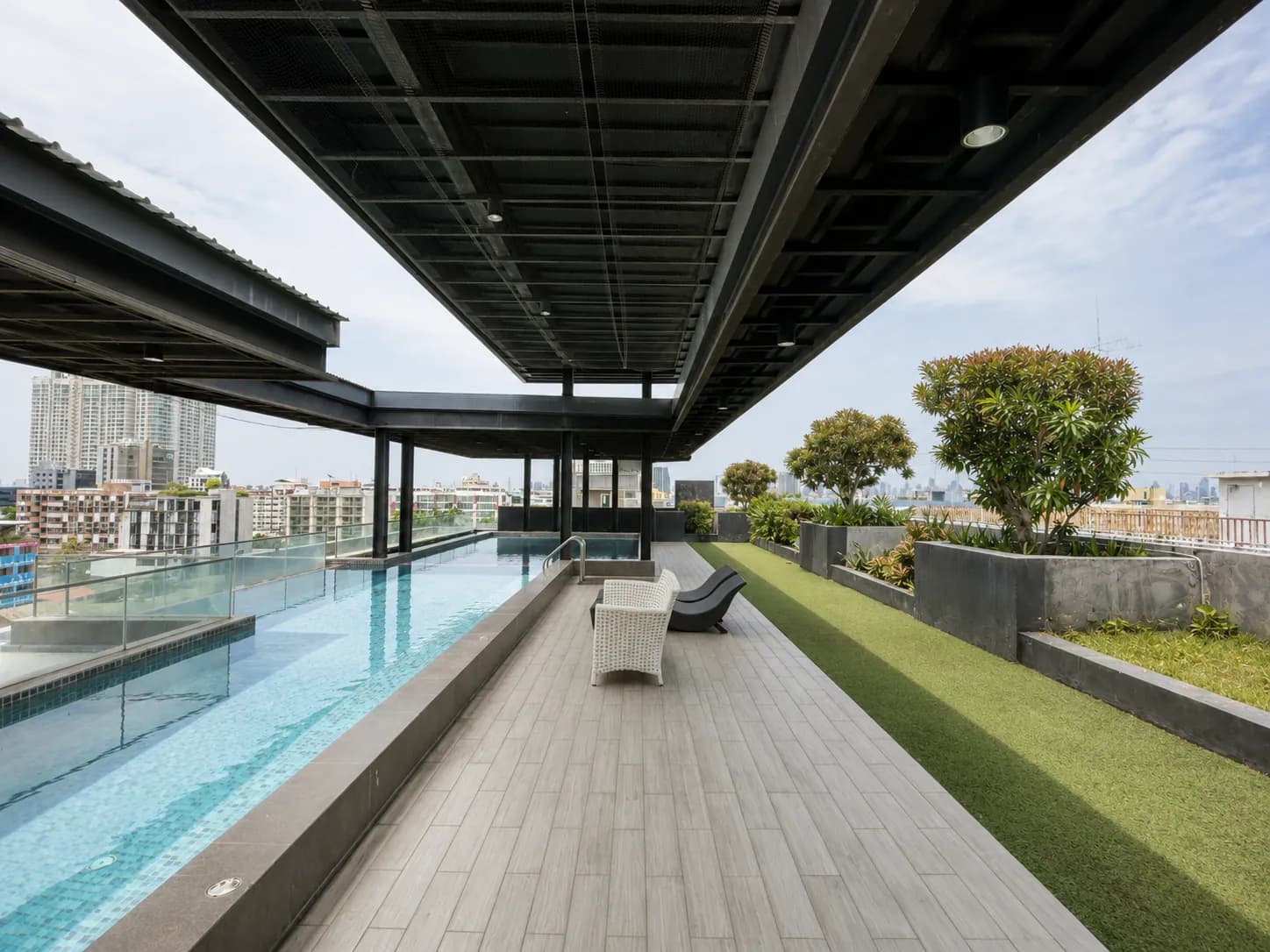 Rooftop saltwater swimming pool and deck at The Unique Ratchada 19