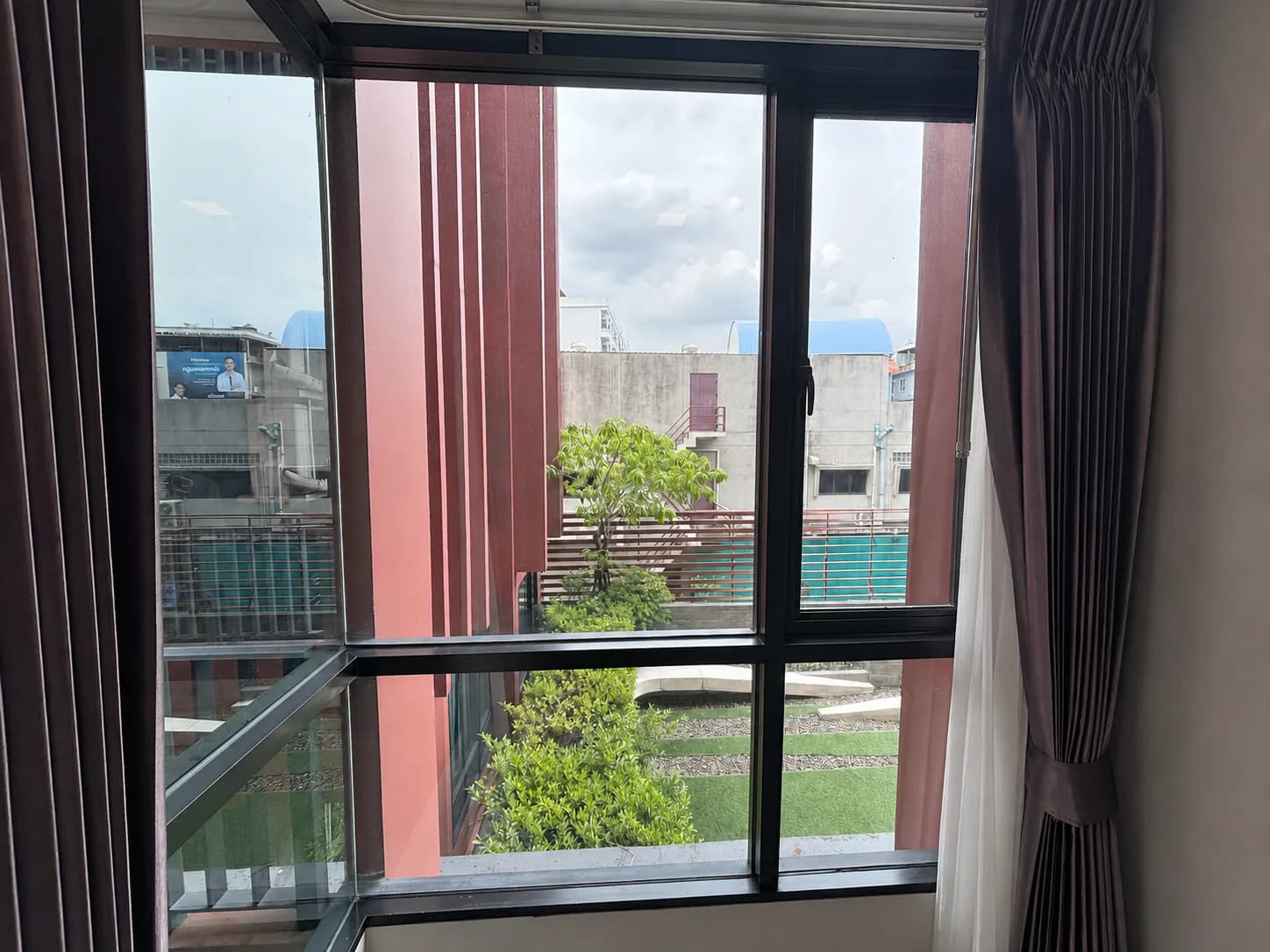 North-facing garden and courtyard view from the Brown Condo unit