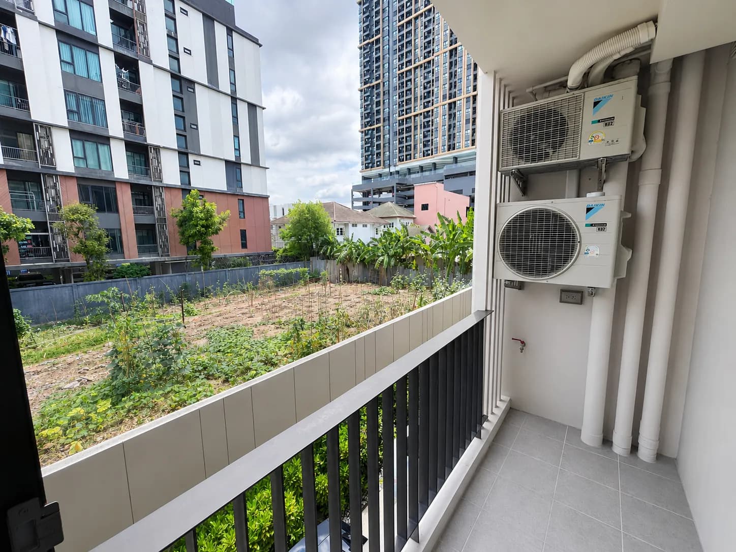 Balcony and air-conditioning units at the Vivere unit