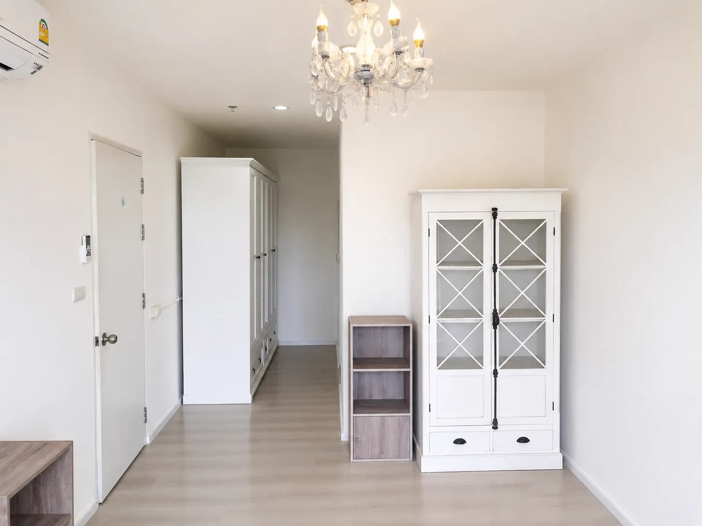 Bright bedroom with closet at Aspire Sukhumvit 48