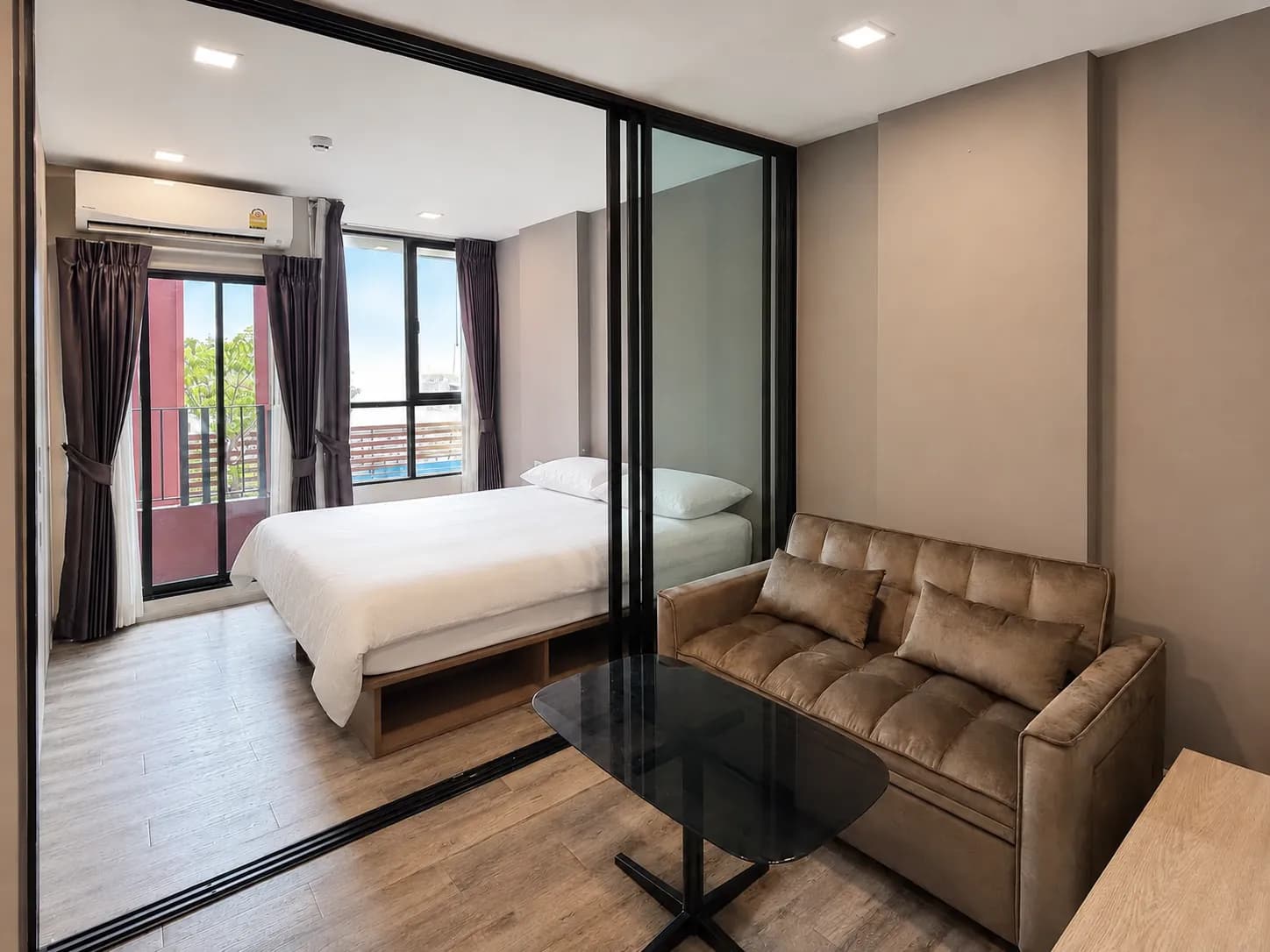 Bedroom with built-in storage in the Brown Condo unit