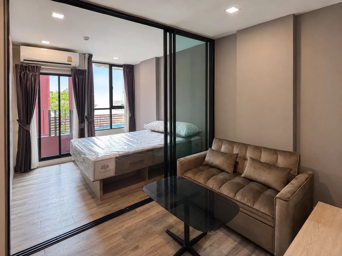 Bedroom with built-in storage in the Brown Condo unit