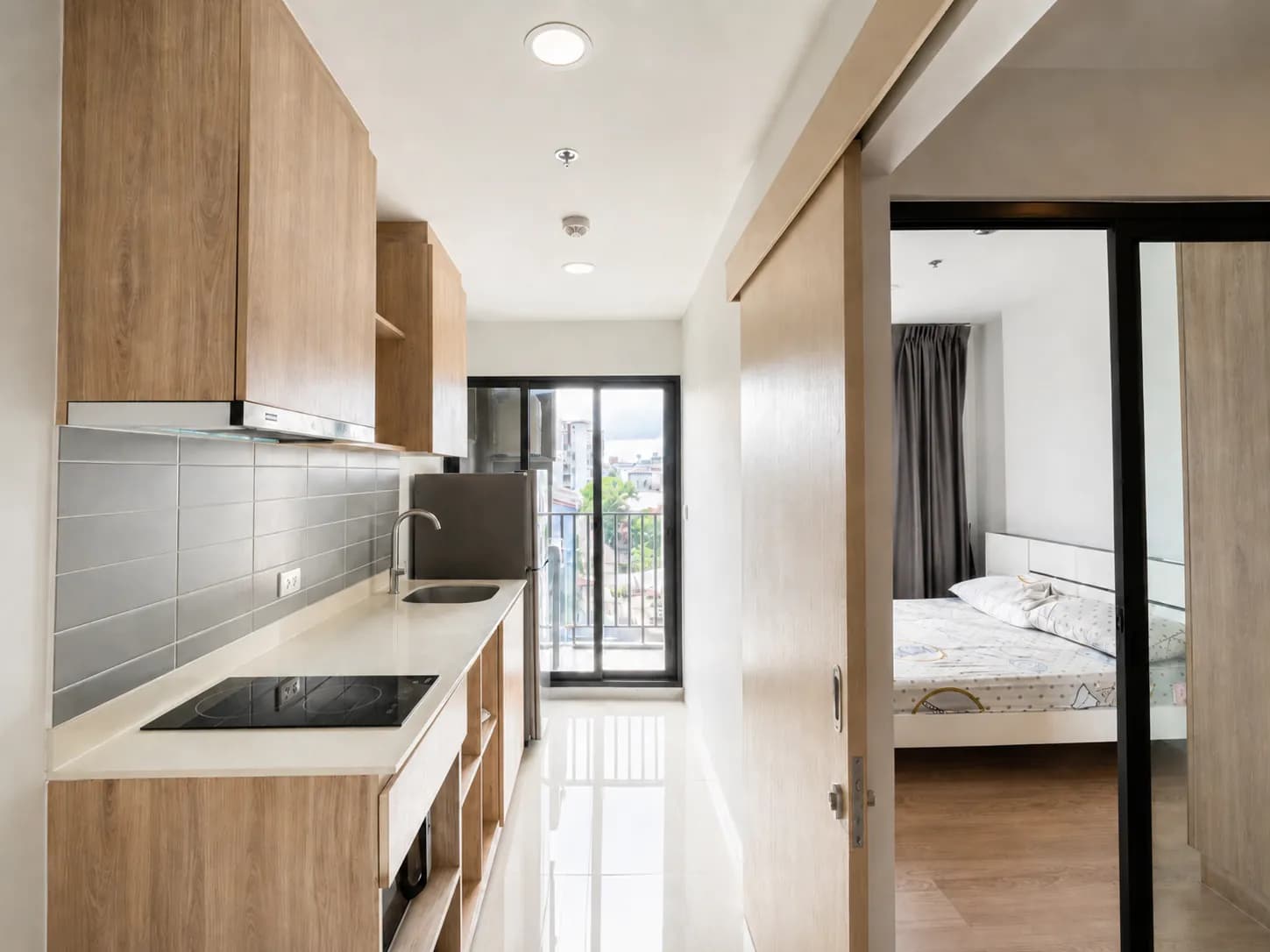 Chewathai Pinklao bedroom with a compact separate kitchen